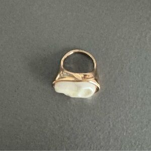 Elegant Gold and Cream Ring